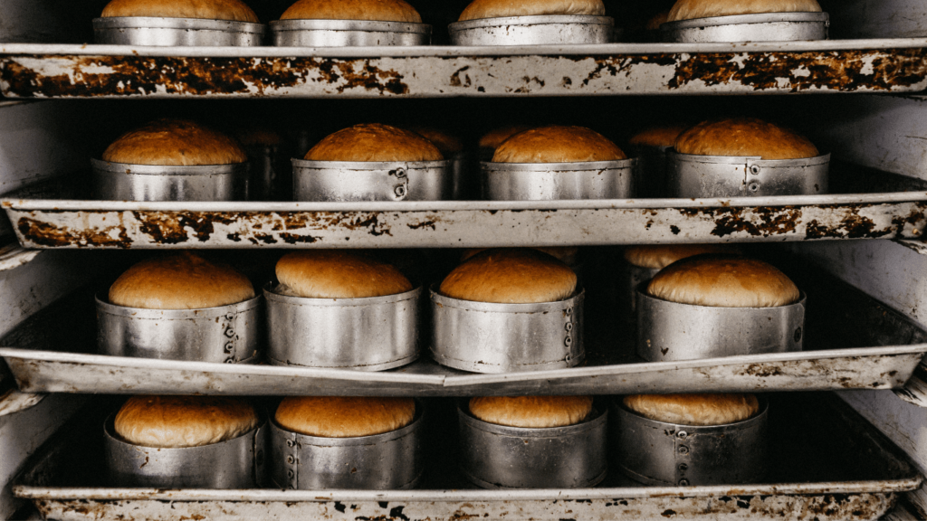 Image of deck oven full of baking trays